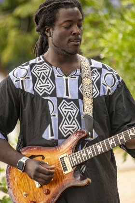 Tyrell Elegonye performs with the group Mega'Tune at the South Main Arts Festival on Saturday, October 21, 2023.