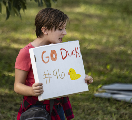11-year-old Bonnie Stewart cheers on a rubber duck during the annual Duck Race held Saturday, October 21, 2023 at San Gabriel Park.   The annual event is a fundraiser for the  American Association of University Women (A.A.U.W.). 50 rubber ducks were released into the water in five separate heats.  The top winners in each heat were gathered together for a championship heat.