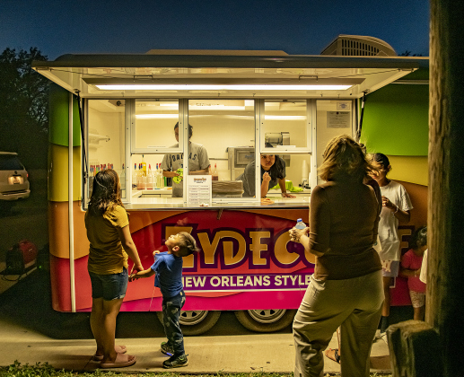 Zydeco Ice distributed shaved ice treats to attendees at a National Night Out event held at San Jose Park.