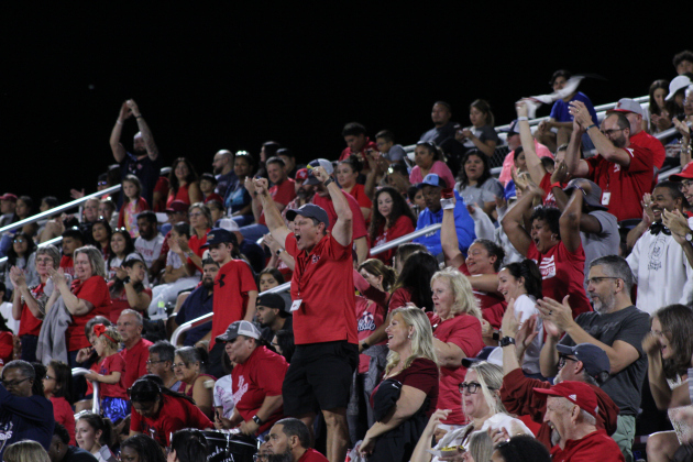 An East View supporter cheers for the Patriots. Photo by Nalani Nuylan.