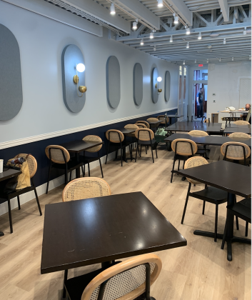 The first floor of the building features two top and four top tables for guests. (Photo by Kaitlyn Wilkes)
