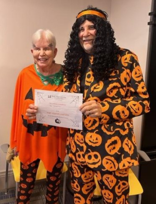 Paula and Ren Weedon used Halloween's unofficial jack-o-lantern mascot to win the Hacienda’s costume contest.
