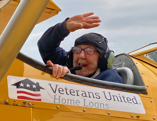 Marine veteran Betty McCann waves as her DreamFlights with Darryl Fisher begins.