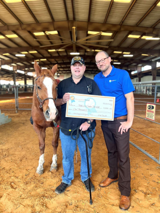 Erik Stoeckle, center, is one of seven recipients of the 2023 RecognizeGood Legend Award. As of writing, he has 18,000 volunteer hours with ROCK. Photo courtesy of Ride On Center for Kids.