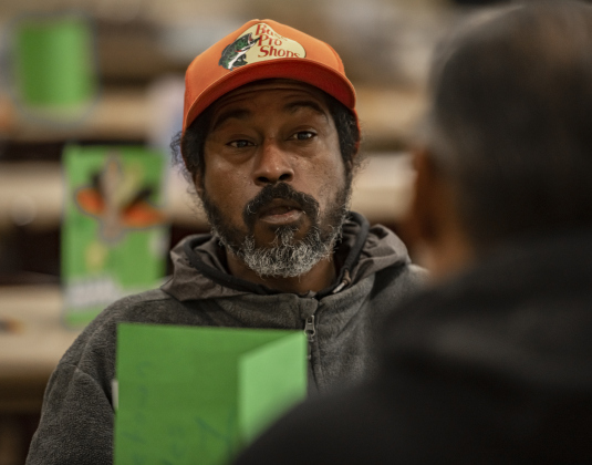 Corey Laurant, who shared that he is homeless, enjoyed a holiday meal at the Community Thanksgiving, held at the Georgetown Community Center in San Gabriel Park on Thursday, November 23, 2023.