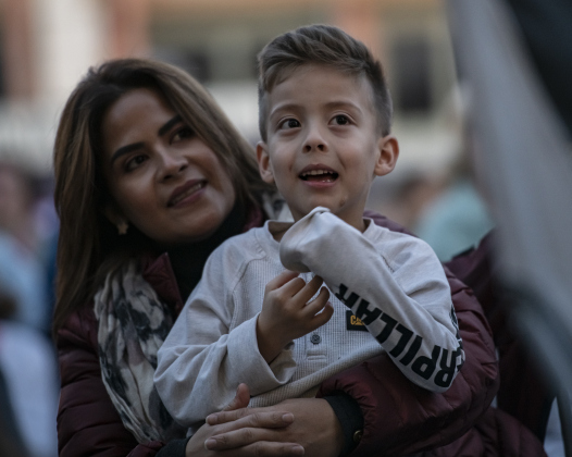 5-year-old Dominic Gomez takes in the sights of  the Lighting of the Square with his mom Tatiana Gomez  on Friday, November 24, 2023.