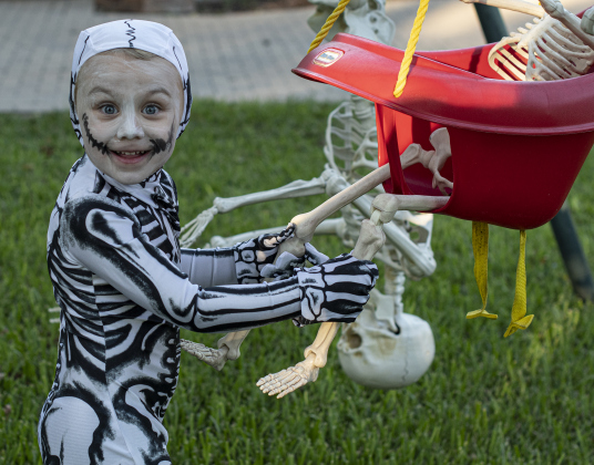 3-year-old Buck Taylor had fun on Halloween night with his family along Main Street in Old Town on Tuesday, October 31, 2023.