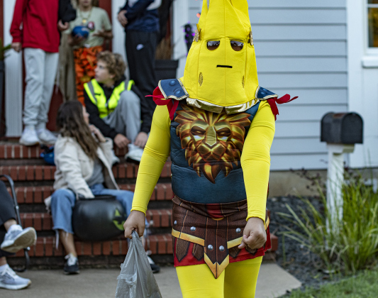 10-year-old Jonathan Aranda, dressed as a banana, enjoyed trick-or-treating on Main Street in Old Town on Tuesday, October 31, 2023.