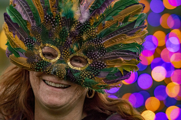 Susan Aragon-Long wore her peacock mask while enjoying Halloween on  Main Street in Old Town on Tuesday, October 31, 2023.