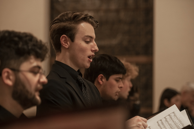 Members of the Southwestern University Chorale sing during Southwestern University's Candlelight Service at Lois Perkins Chapel on Thursday, December 7, 2023.