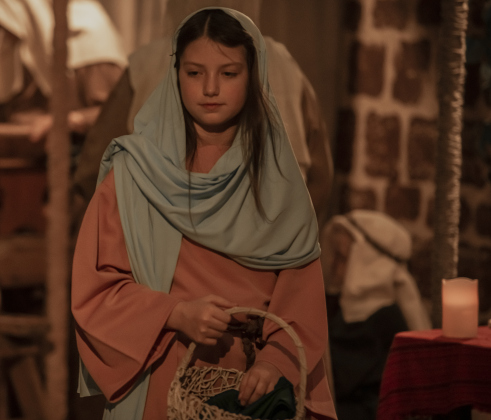 11-year-old Isabel Gutierrez was in her role as a villager at  Immanuel Lutheran Church for the  Pilgrimage to Bethlehem, the church's Live Nativity, on Saturday, December 9, 2023.