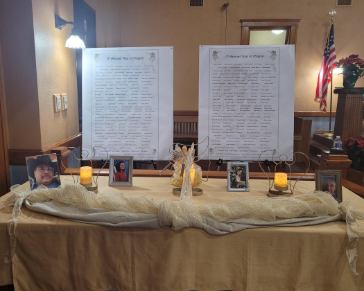 A table shows the list of names of the victims of violent crime. The ceremony lasted an hour with a lighting of the Peace, Hope and Healing Candles, speeches and musical performances.