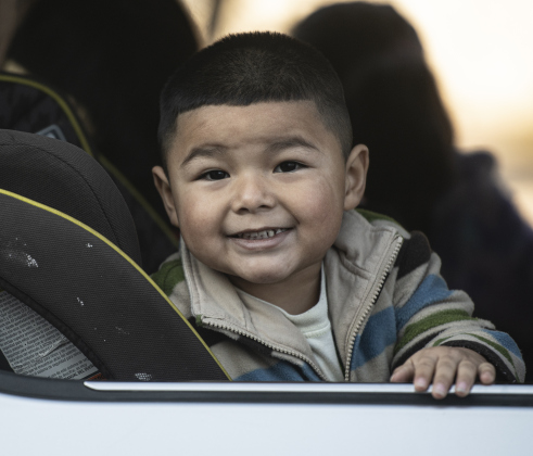3-year-old Omaet Hernandez was one of  the recipients receiving gift boxes  during the Georgetown Police Department's Blue Santa distribution, held Saturday, December 16, 2023.
