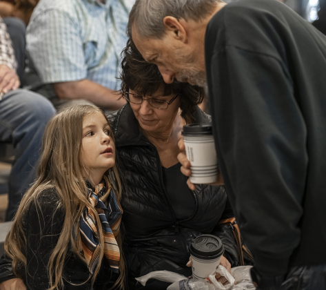 9-year-old Kymber Wilson, a member of the Jarrell 4-H Club, gets encouragement from her grandparents, Larry and Rhonda Camp, while waiting to go back into the competition arena with other contestants during the Market Rabbit Show at the Williamson Livestock Show  on Sunday, December 3, 2023.