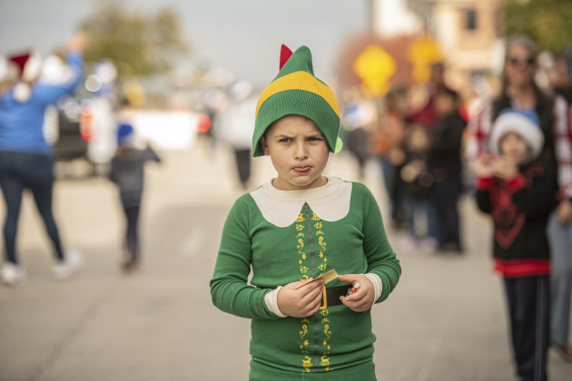 7-year-old Bowen Currey was dressed as an elf as he watched the parade along Austin Avenue.