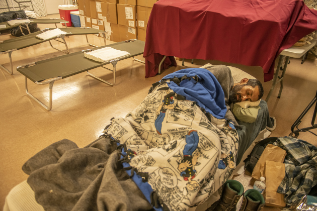 Artemio Olivarez settles in for the night on Sunday, January 14, 2024 at the Madella Hilliard Neighborhood Center, located at 803 West Eighth Street.  Photos by Andy Sharp. 