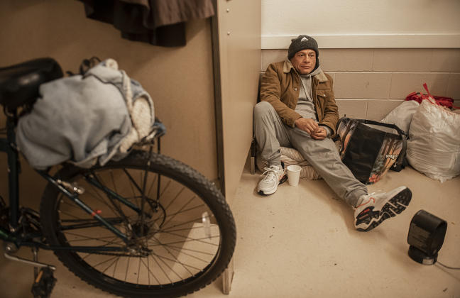 David Valdez shelters inside a restroom behind the Grace Heritage Center  on Sunday, January 14. Photo by Andy Sharp