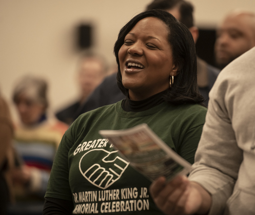Michelle Watson, wife of Rev. Dr. Anthony L. Watson, Sr., pastor of The First Baptist Church of Taylor, joins others in singing "Lift Every Voice and Sing" during Taylor's Dr. Martin Luther King, Jr. holiday observance held in the Taylor City Hall auditorium on Monday, January 15, 2024.