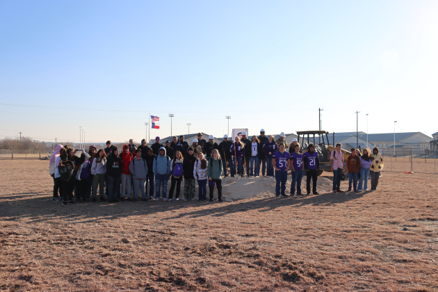 Members from the Florence Independent School District, Leander-based construction company Braun and Butler and students from the band and athletic programs at Florence High School pose in before breaking ground on the future site of the Band Hall and field house last Friday. Photo courtesy of Florence ISD.