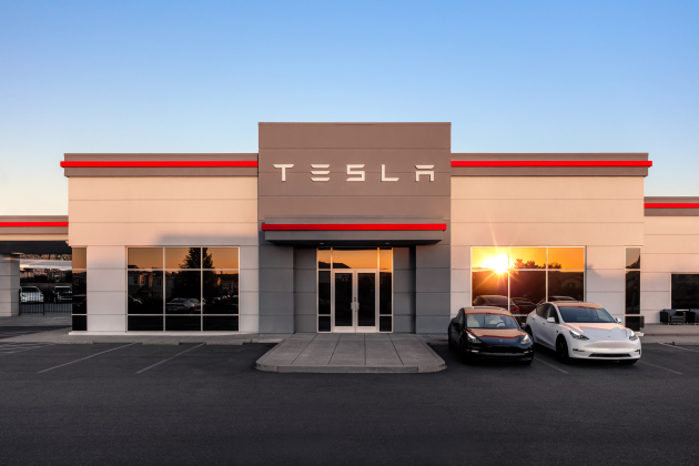 The sun sets on a Tesla store. Photo courtesy of Tesla Inc. 