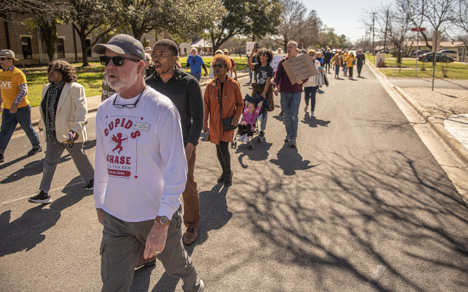 Scott Butler (front),on Martin Luther King, Jr. Street,   was among those marching from the Georgetown square during the Dr. Martin Luther King, Jr. march and program held on Monday, February 19th, 2024.