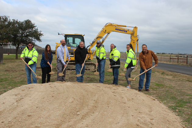 From left to right Scott Ambrus (Chasco), Jarrell Council Member Tanya Clawson, Whit Friend (HNTB), Pct. 4 Commissioner Russ Boles, Joseph Jones (HNTB), Joe Cobuccio (Chasco), Lauren Sharpe (Chasco), Oscar Salazar-Bueno (HNTB) break ground on County Road 332 expansion. Photo courtesy of Williamson County.