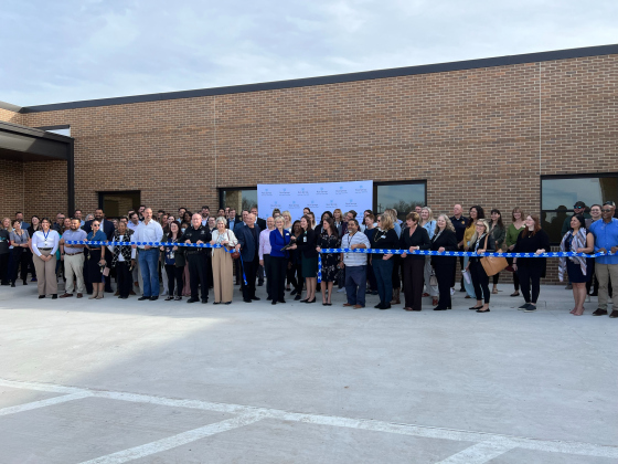 Members from Rock Springs, Williamson County, Bluebonnet Trails and others from the mental health task force cut a ribbon, opening the new adolescent wing called the Maple Unit. Photo courtesy of Williamson County. 