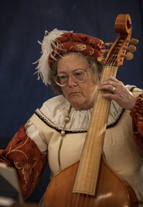 Morgan, a member of The Stellar Kingdom of Ansteorra, joined other musicians as she played her Viola de Gamba at the San Gabriel Community Center on Saturday, February 3, 2024.   Morgan explains that this kind of instrument has been used since the 16th Century, pre-dating the cello by a century.