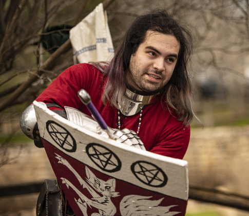 Renard prepares for a fencing match outside the  San Gabriel Community Center.