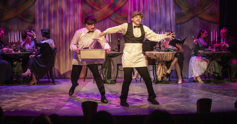 Jake Jordan, front left, as the busboy, and Will Mallick, right, as the head waiter, are  shown in a  Thursday, February 1, 2024 photo from the Palace's Springer Stage production of  "She Loves Me," playing through March 3. Photo by Andy Sharp.