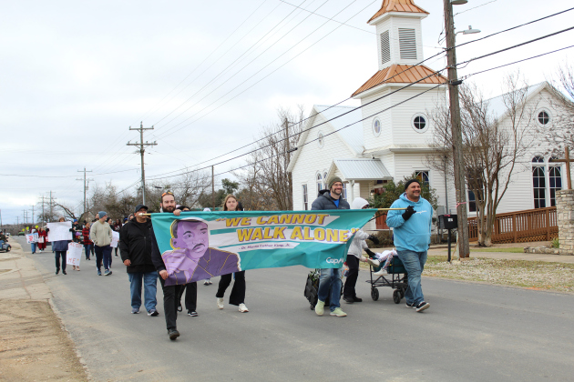 Volunteers lead the Leander’s Martin Luther King Day march at South West Drive in Old Town Leander on Saturday, January 28.