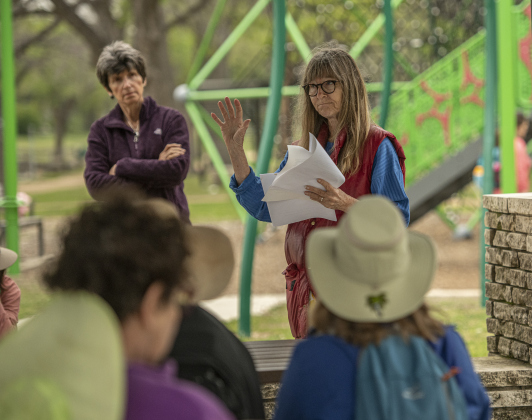 Helen Cordes, an area historian, leads a group at San Gabriel Park to talk about the history of Native Americans in the Georgetown area on Sunday, March 24. Native American singers also performed songs for attendees during the event, and a new Georgetown powwow was discussed. The powwow will be held on September 28 at the Boys and Girls Club of Georgetown.