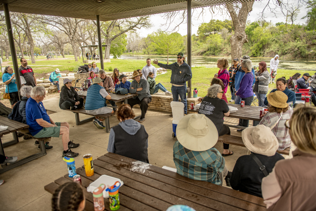 Andrew Richey (standing at center in cap and sunglasses) is a producer and director of “Tonkawa: They All Stay Together,” a documentary film following the life of the Tonkawa tribe over two years. The movie is scheduled