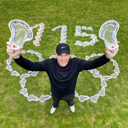 Phantom Lacrosse founder Michael Hazy poses with new Lacrosse heads. Photo courtesy of Phantom Lacrosse.