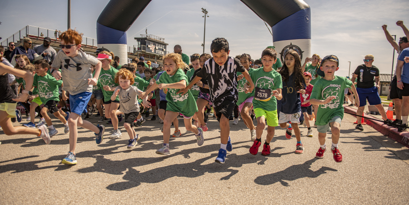 Participants take off from  the starting line in  the Fun Run.