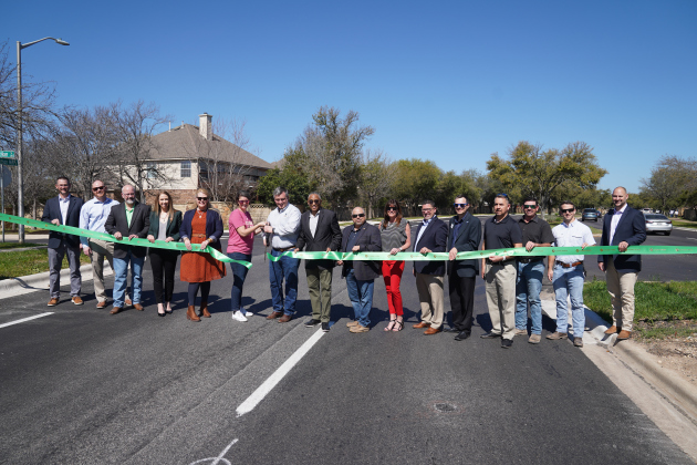 City of Cedar Park staff, along with design and construction partners, cut the ribbon celebrating the Anderson Mill Road Phase 2 project completion. Photos courtesy of Cedar Park.