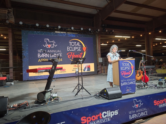 ROCK Founder and CEO Dr. Nancy Krenek gives a speech at the 18th annual Barn Dance on Saturday, April 6.