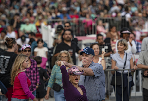 Dottie Cahall and her husband Ken dance to the music of  Dysfunkshun Junkshun on the opening night of the Red Poppy Festival on Friday, April 26.  Photo by Andy Sharp
