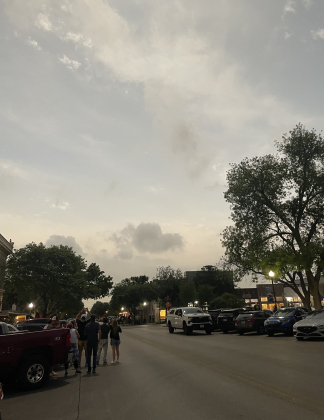 The sky over the Square brightens up again as totality leaves the area.