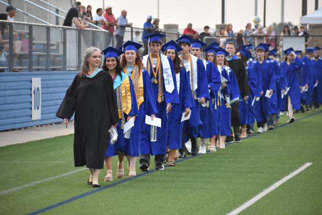 Georgetown High School graduates-to-be process into Birkelbach Stadium.