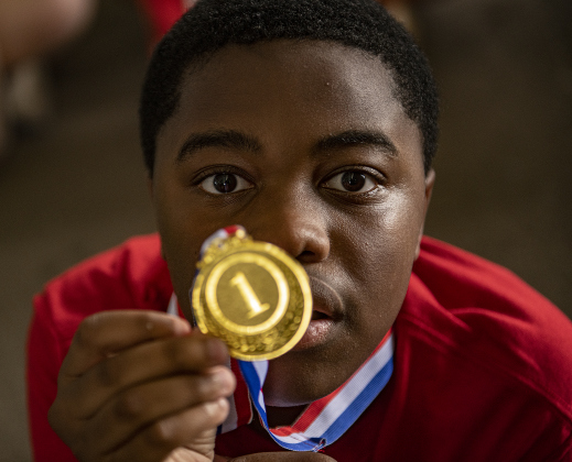 11-year-old Gideon Mose (note to Eds: it's Mose, not Moses) a student at Forbes Middle School, holds a medal he won during  the Georgetown Independent School District's annual Special Olympics, held Tuesday, May 7, 2024  at the district sports complex behind Georgetown High School.     Photo by Andy Sharp.
