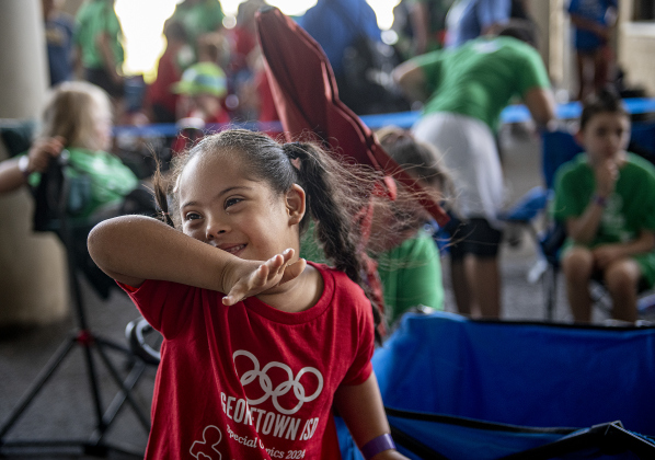 6-year-old Skyla Jones, a kindergartener at McCoy Elementary, was happy to be participating in the Georgetown Independent School District's annual Special Olympics, held Tuesday, May 7, 2024  at the district sports complex behind Georgetown High School.     Photo by Andy Sharp