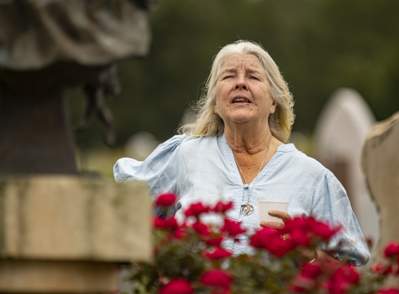 Ellen Brumder, a co-founder (with her husband, Nick) of Our Lady of the Rosary Cemetery & Prayer Gardens, was on hand Saturday, April 27, 2024 to celebrate Art in the Gardens, the 20th anniversary of Our Lady.  The couple live in New Zealand, but return to the area occasionally.    Photo by Andy Sharp. 