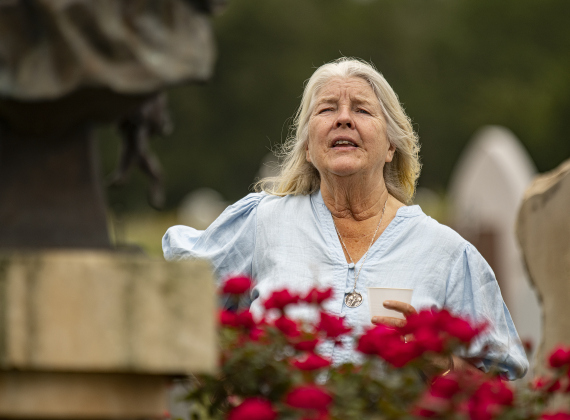 Ellen Brumder, a co-founder (with her husband, Nick) of Our Lady of the Rosary Cemetery &amp; Prayer Gardens, was on hand Saturday, April 27, 2024 to celebrate Art in the Gardens, the 20th anniversary of Our Lady.  The couple live in New Zealand, but return to the area occasionally.    Photo by Andy Sharp.