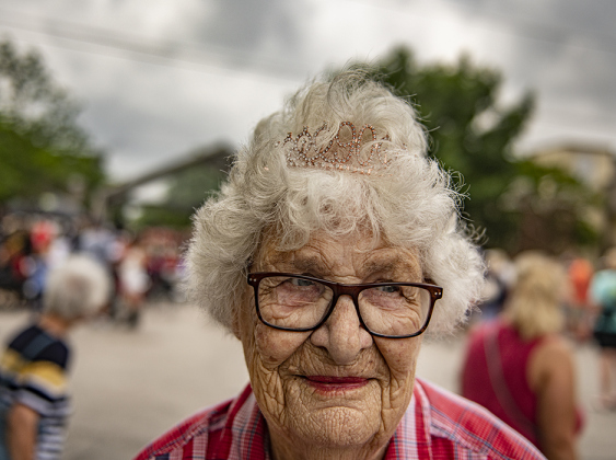 Joan Vallance, wearing a special tiara, was celebrating her 90th birthday during the 25th Annual Red Poppy Festival .