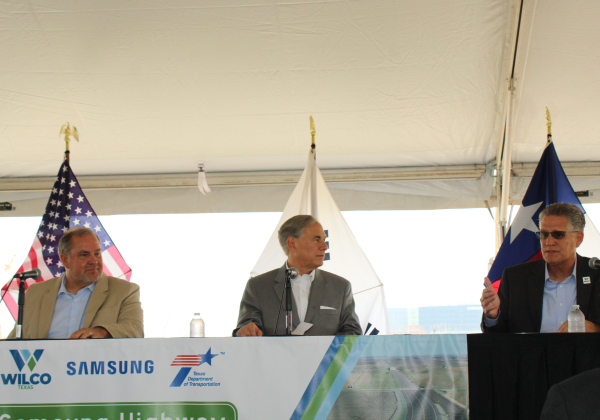 From left to right, County Commissioner Russ Boles, Governor Greg Abbott and County Judge Bill Gravell talk about the Samsung Highway and how the project will improve the Taylor area.