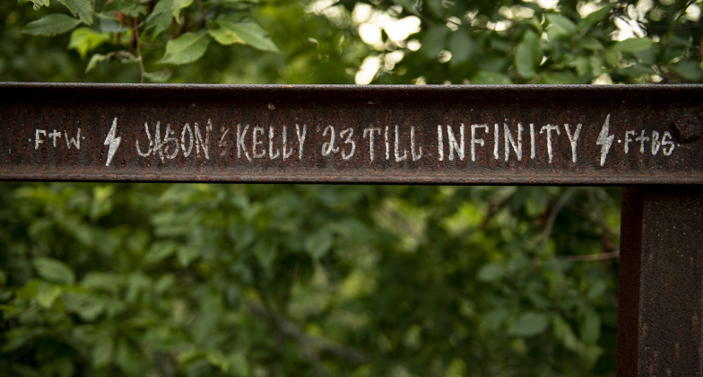 A beam bears the thoughts of a couple on the truss bridge along County Road 366 in the Rowe Valley area on Tuesday, June 11, 2024.
