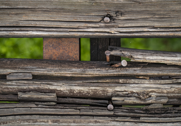 The wood along the surface truss bridge along County Road 366 shows the effects of years of wear, not just by vehicles,  in the Rowe Valley area on Tuesday, June 11, 2024. Photo by Andy Sharp