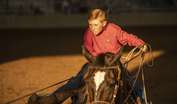 Wesson Dewitt does his part in Team Roping at the 1st Annual Bill Pickett Youth Rodeo, held at the Williamson County Expo Center  on Saturday, June 15, 2024.   The rodeo was open to entrants 18-years-old or younger.    Photo by Andy Sharp.