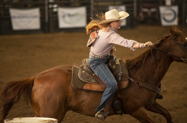 Raelynn Cox competes in Barrel Racing  at the 1st Annual Bill Pickett Youth Rodeo, held at the Williamson County Expo Center  on Saturday, June 15, 2024.   The rodeo was open to entrants 18-years-old or younger.    Photo by Andy Sharp.